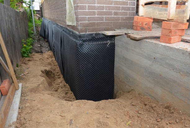 Happy homeowners after waterproofing job in La Crosse
